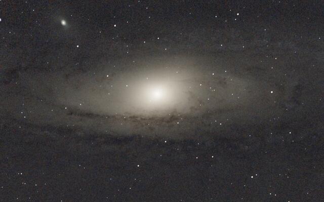 A user's photograph of the Andromeda galaxy taken with AstroCollect, with the satellite galaxy M 110 visible at upper left